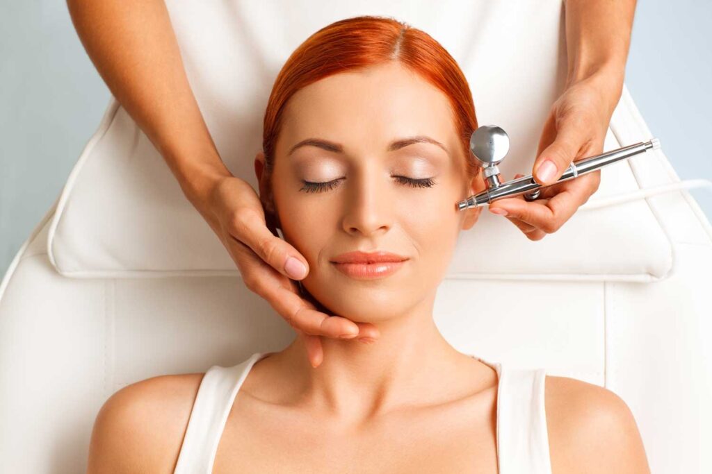 Client relaxing during an advanced facial treatment